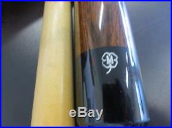 McDERMOTT 20 OZ. 2 PIECE POOL CUE WITH LEATHER WRAP. USED CONDITION