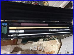 Two pool cues in leather case. Mcdermott E-B7 retired and Sportcraft Titanium